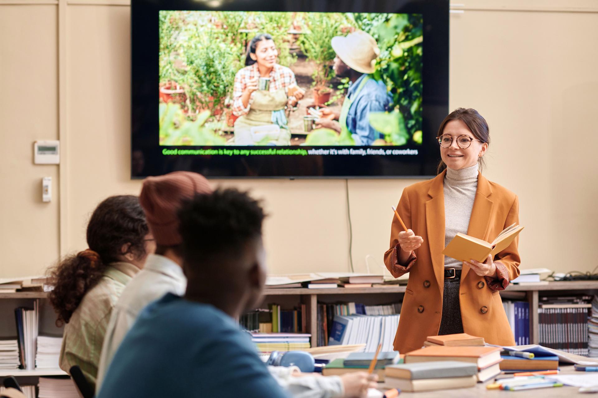Female Professor Giving Lecture
